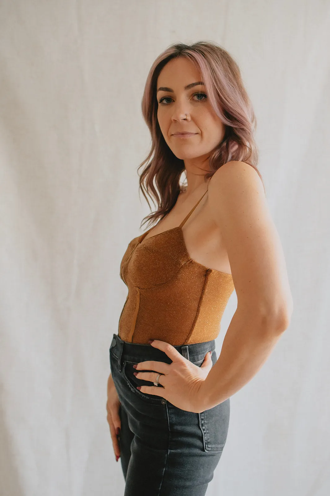 The Shimmer Night Rhythm Bodysuit by Free People - Bronze