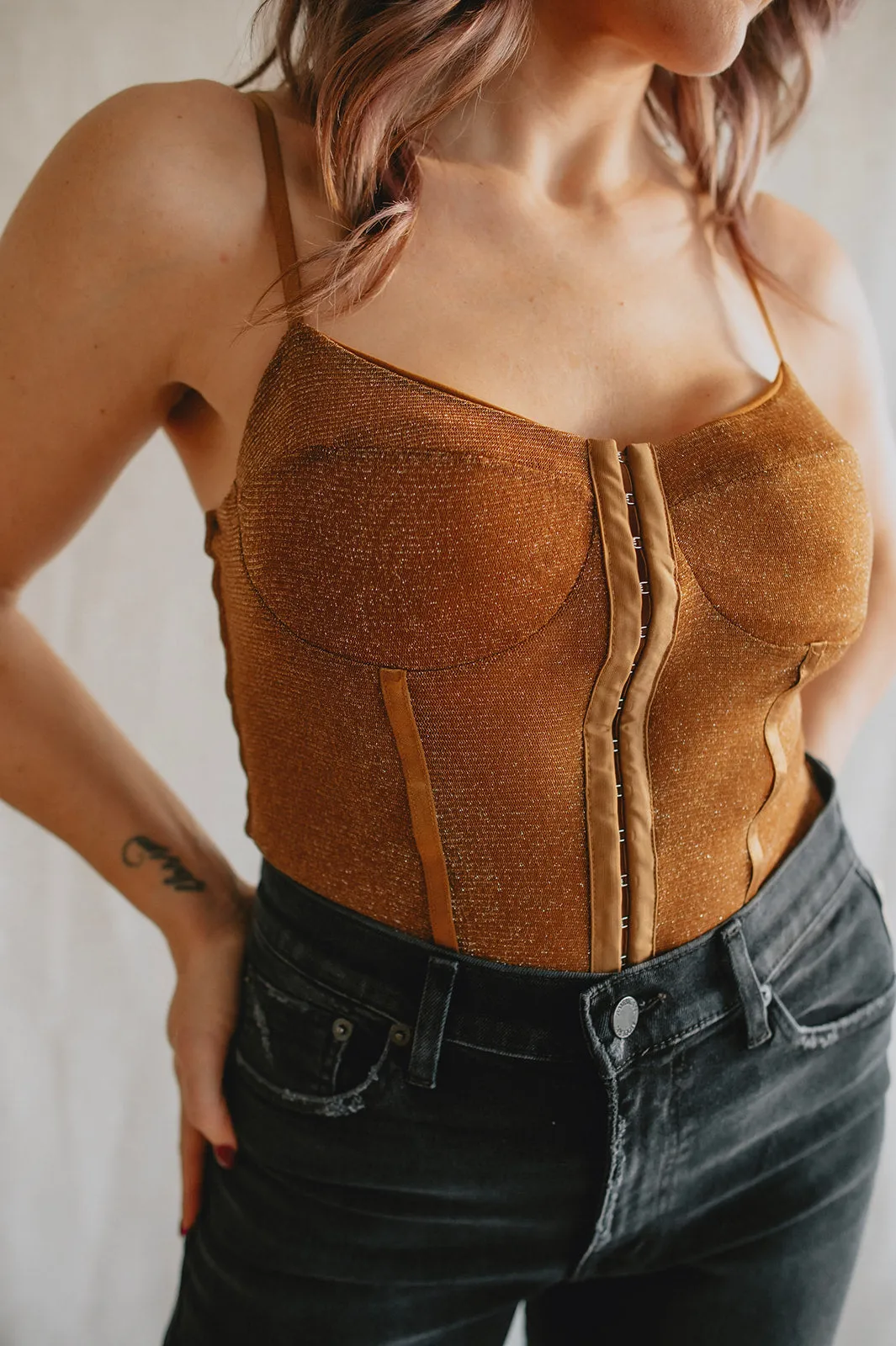 The Shimmer Night Rhythm Bodysuit by Free People - Bronze